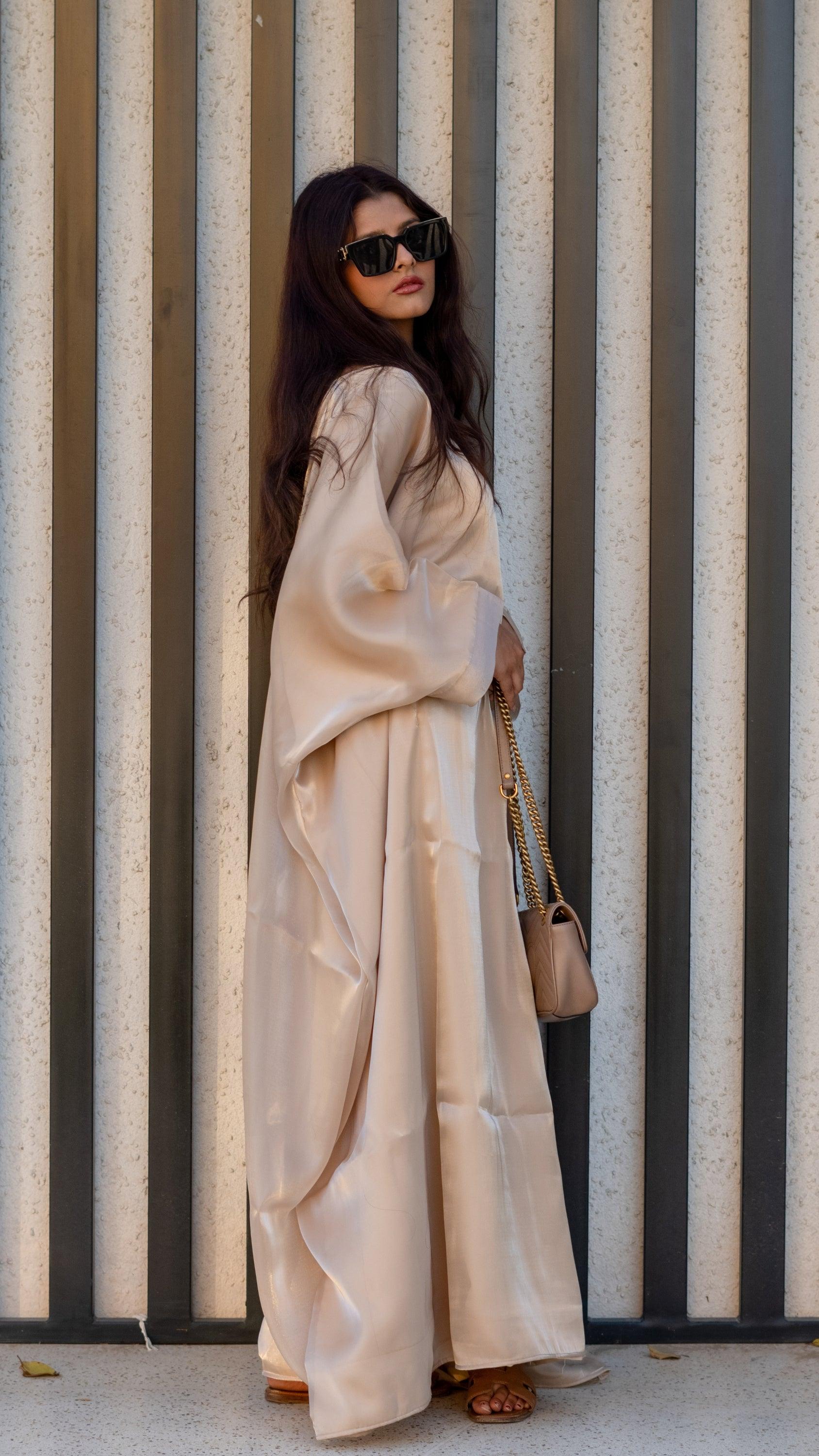 Girl wearing butterfly abaya by Byren Lifestyle Dubai