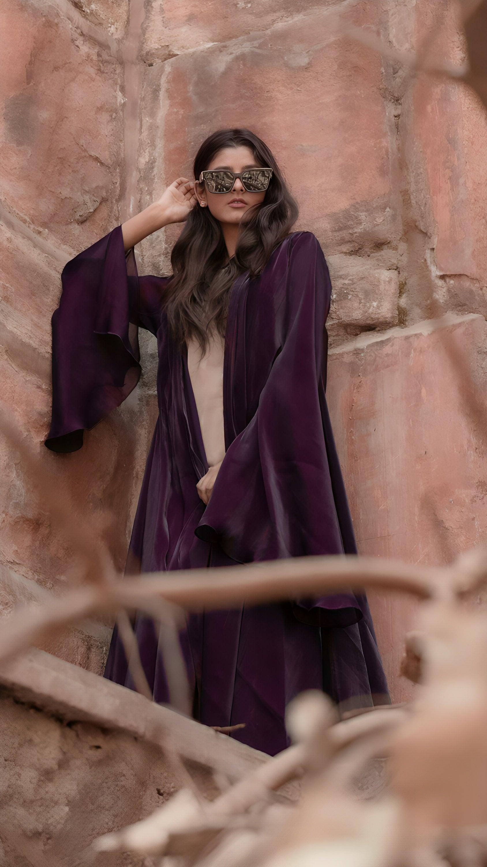 Girl wearing deep purple abaya by Byren Lifestyle Dubai