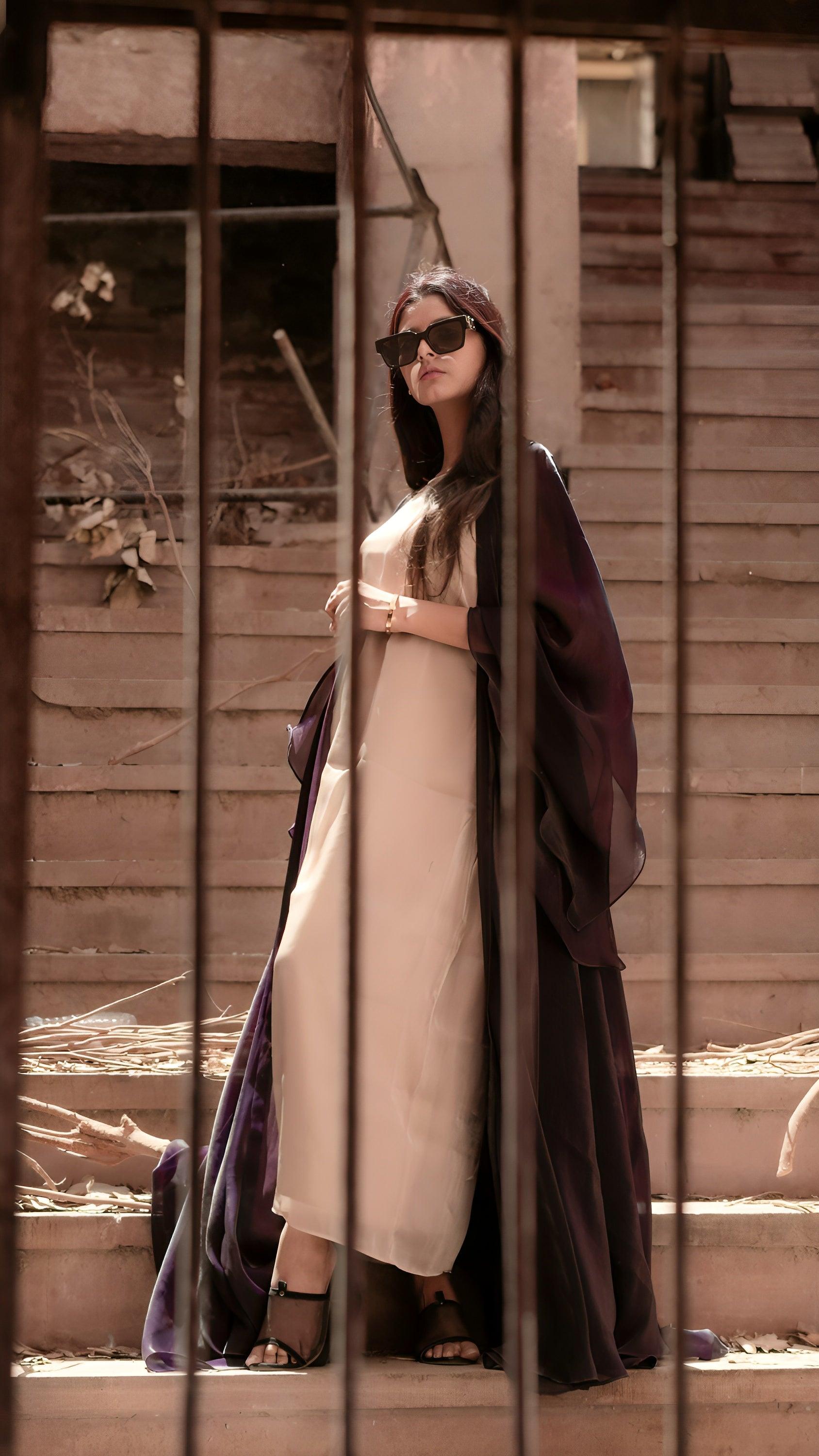 Girl wearing purple abaya