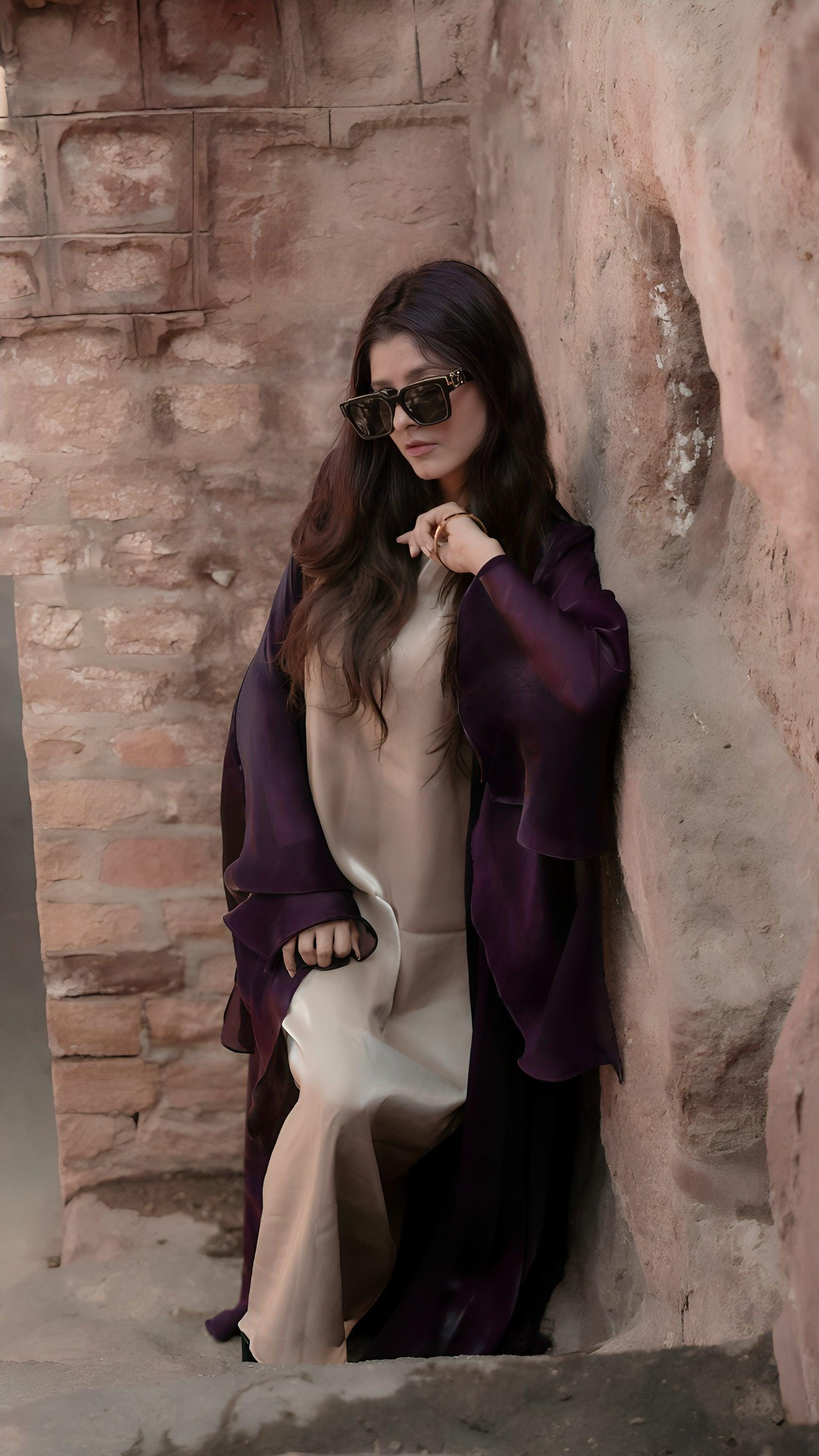 Girl wearing Rich deep purple abaya made by Byren Lifestyle Dubai